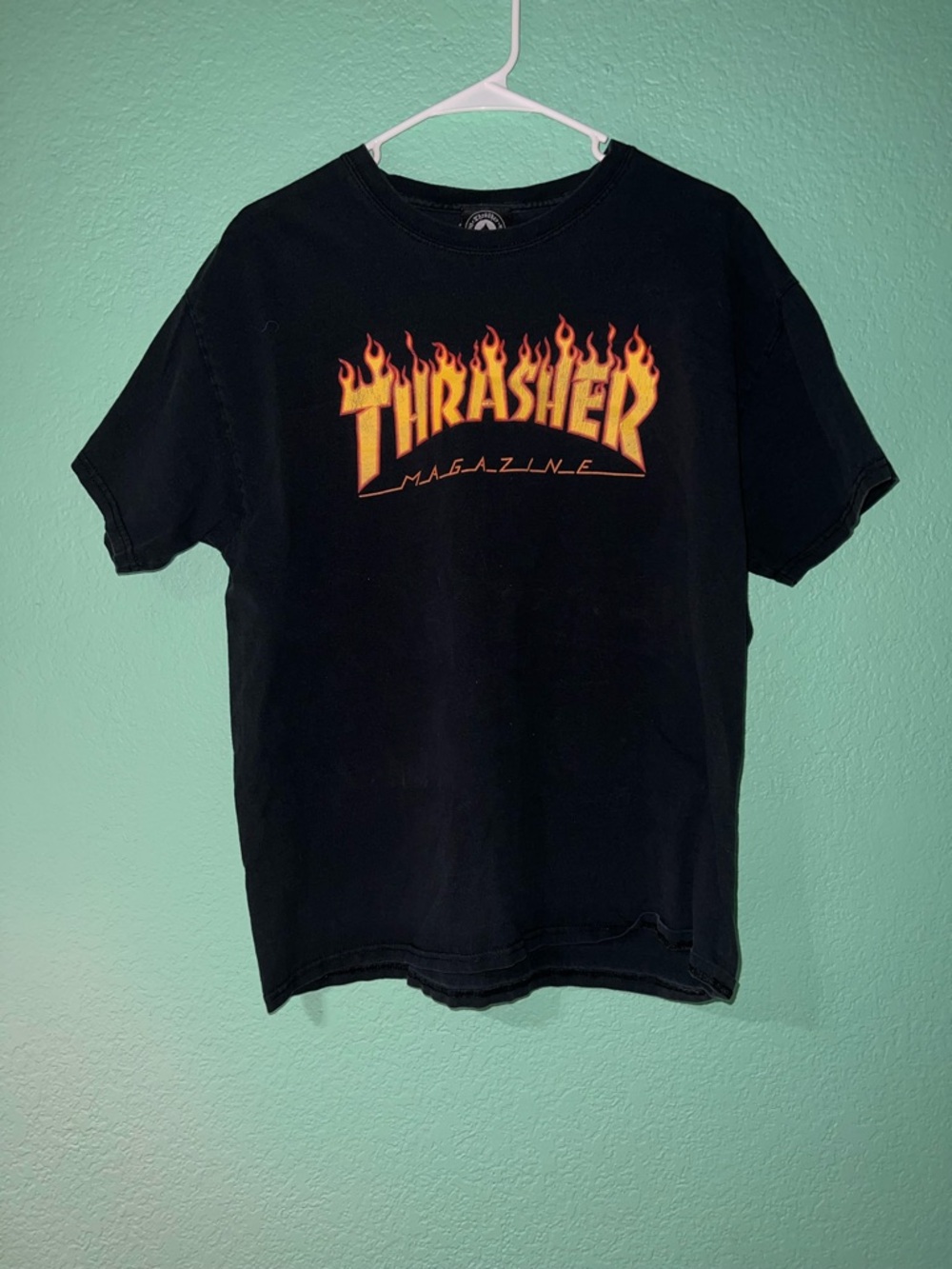 Thrasher Black Tee with Yellow-Orange Flame Logo